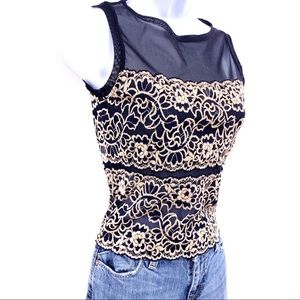 Sophisticated Cache sleeveless top